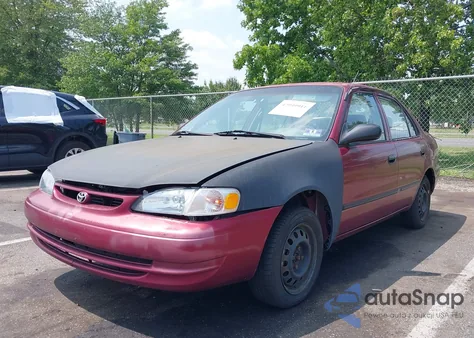 1999 Toyota Corolla Ce из США, поврежденный, VIN 2T1BR12E1XC244432